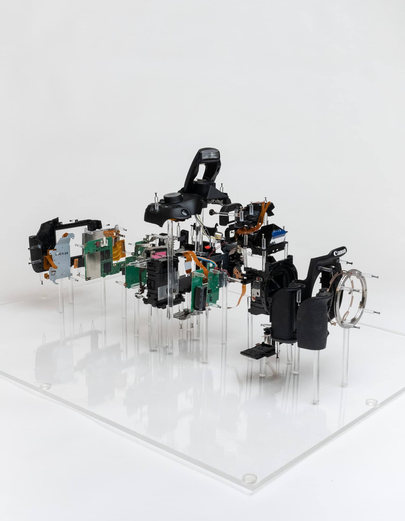 Exploded model of a DSLR camera.
